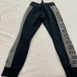 Black and grey Nike pant